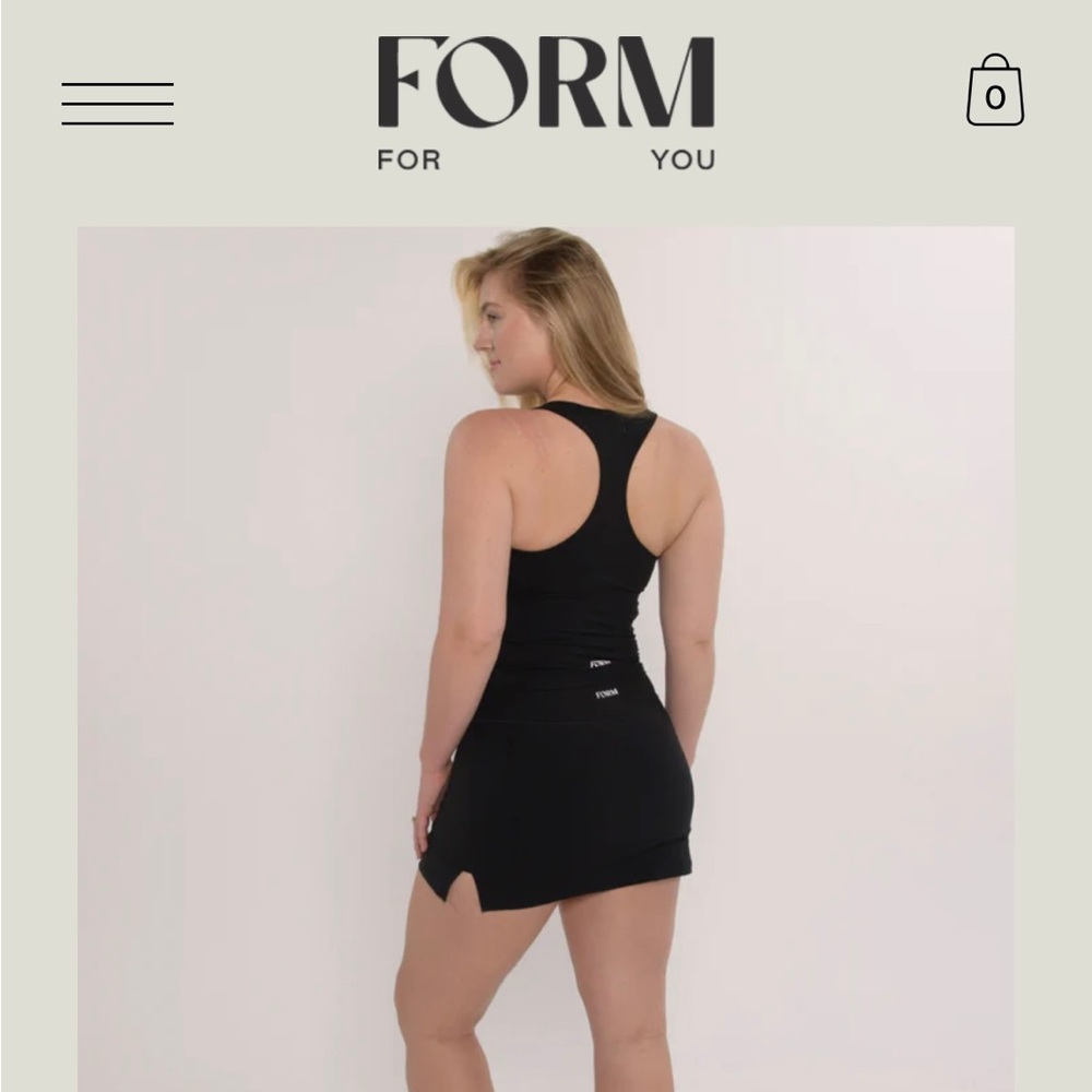 Form size S tennis skirt and bra top, NWOT
